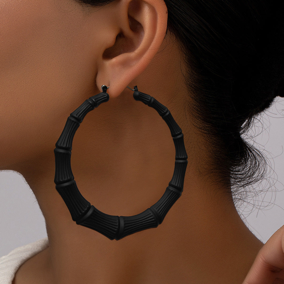 European and American personalized women's earrings, hip-hop circle bamboo knot earrings, exaggerated design, versatile and niche earrings